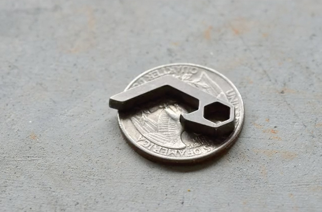 尺寸比一枚硬币还小的工具，世界上最小的开瓶器 新奇创意 第8张